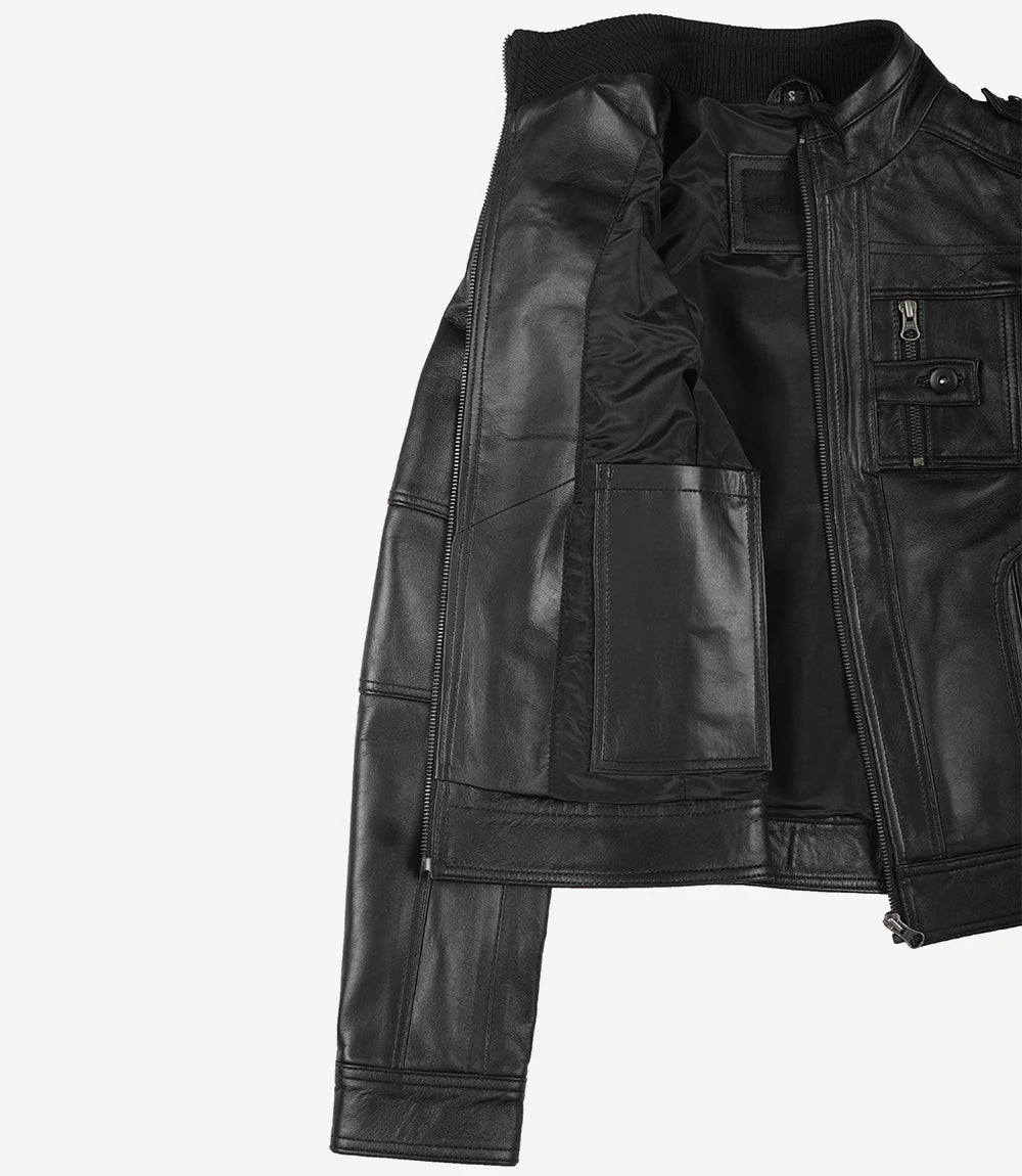 Black leather jacket with zippers and pockets on a white background